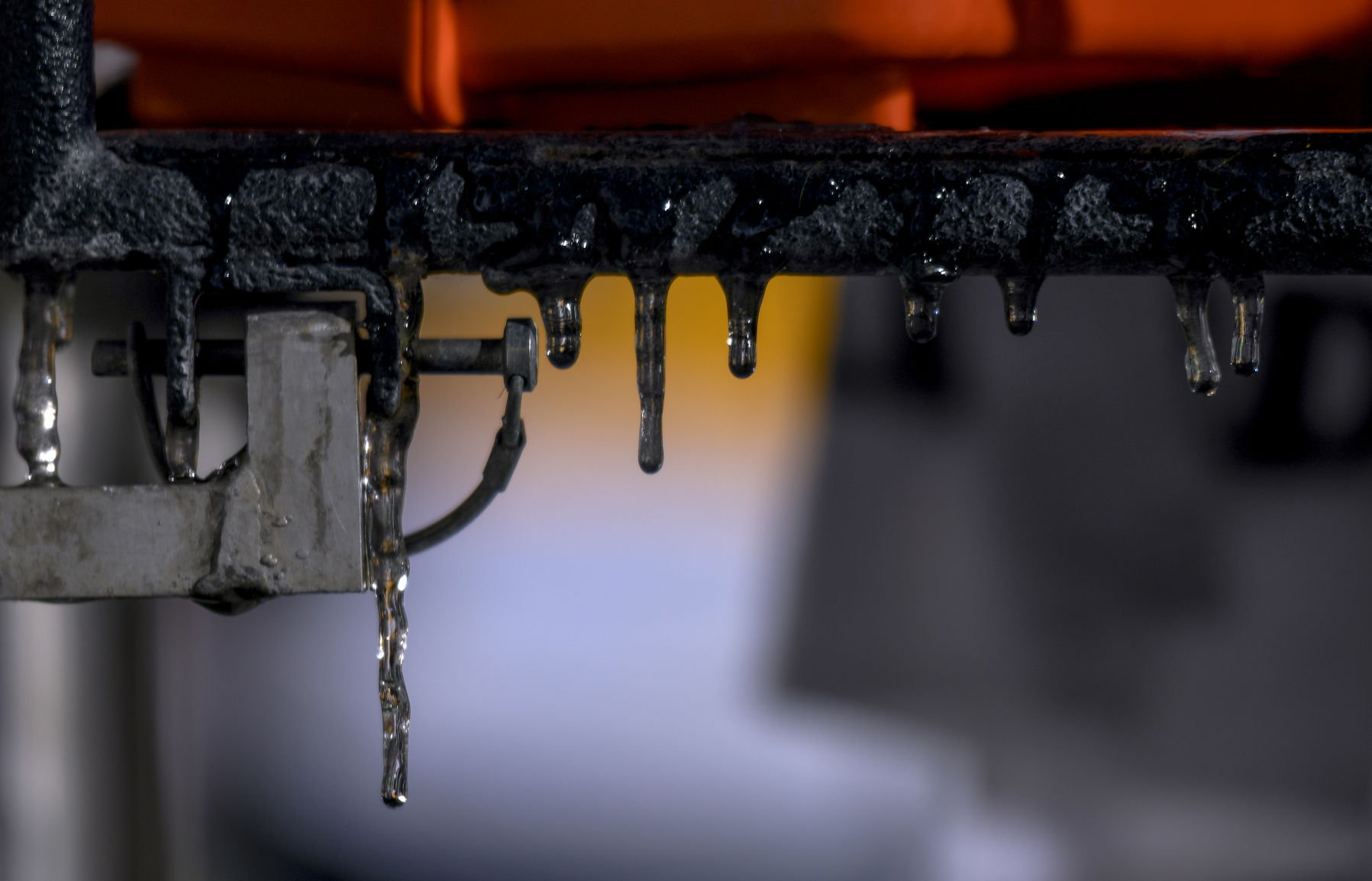 Water dripping off the drink cart freezes
